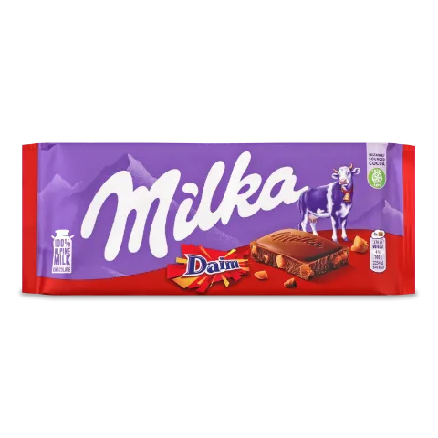 Шоколад мол Milka с кусочками карамели с миндалем